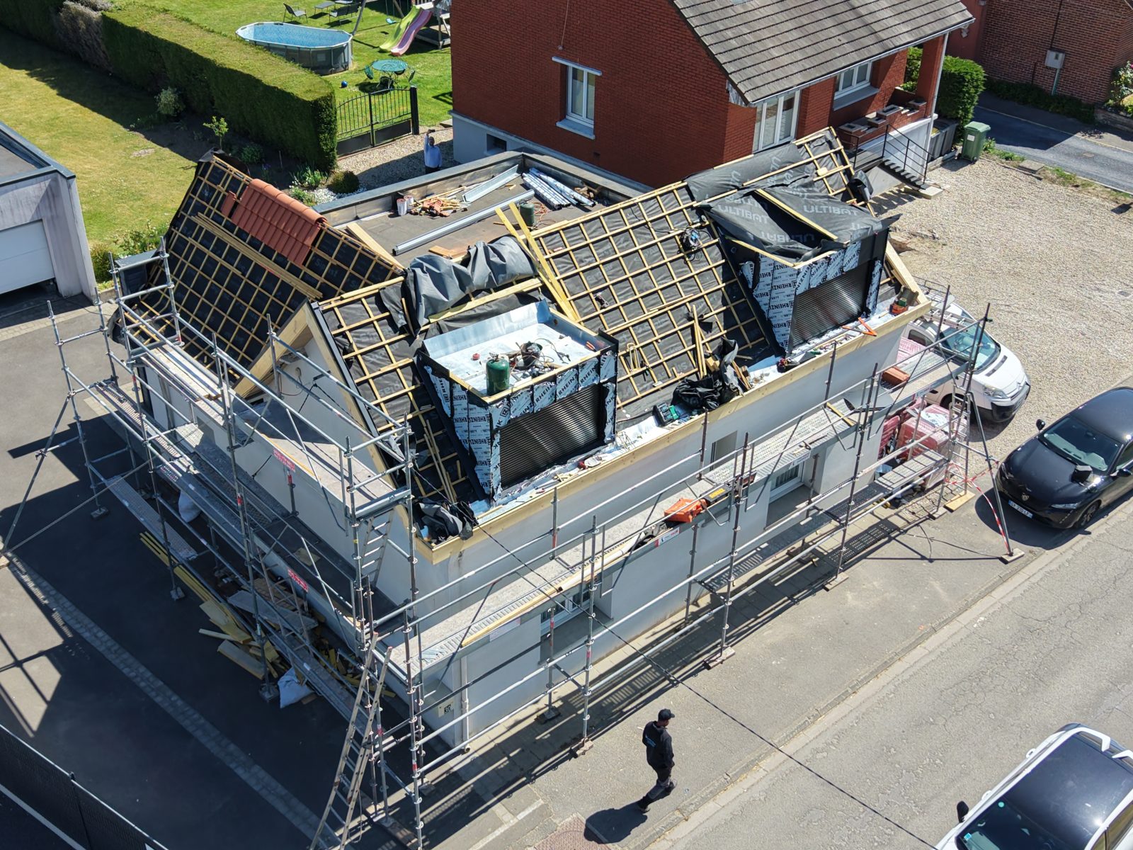 Entreprise de bâtiment dans les Hauts-de-France en action sur son chantier.